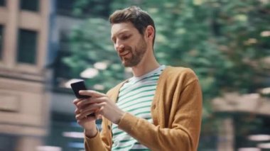 360 Degree Man Using Smartphone on Street