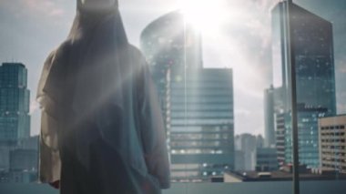 Saudi Emirati Arab Businessman in Office Window