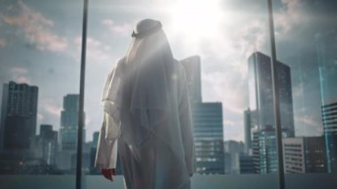 Saudi Emirati Arab Businessman in Office Window