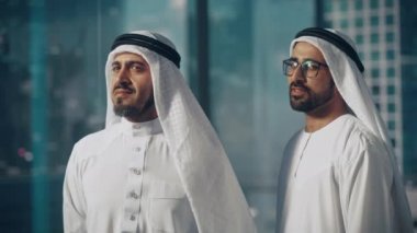 Two Saudi Emirati Arab Businessmen Portrait