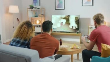 Friends Playing Video Game On Console