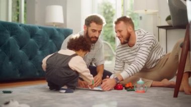 LGBT Family Playing with Child