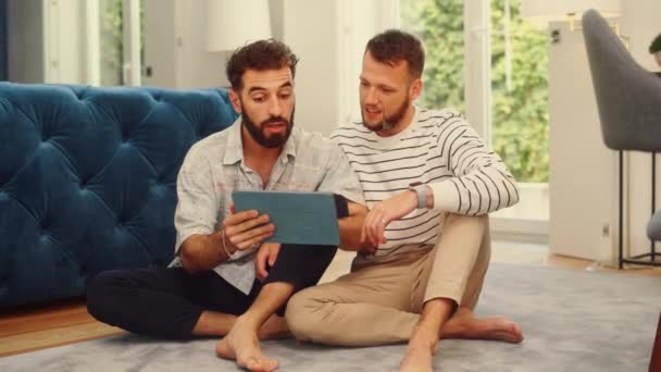 Two Men Using Tablet at Home — ストック動画