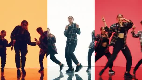 Montaż tancerzy przed animowanym ekranem cyfrowym — Wideo stockowe