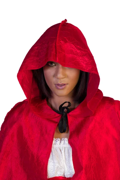 Caperucita roja de pie espiando debajo de su capucha — Foto de Stock
