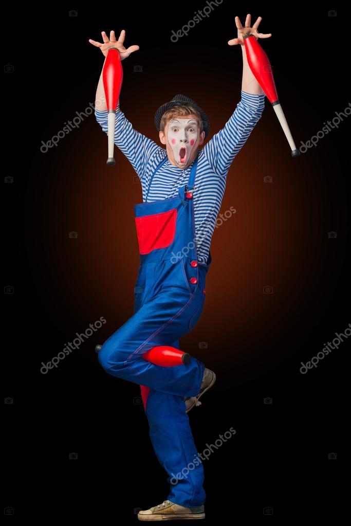 Clown playing with bowling pins Stock Photo by ©photollurg2 48077735