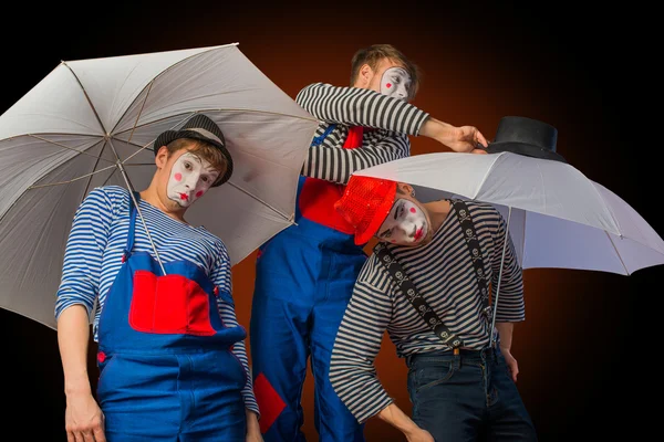 Clowns met paraplu 's — Stockfoto