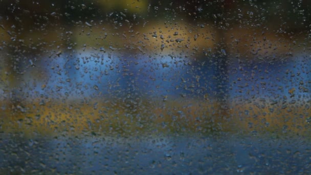 Rain drops on the home window glass with lightning flashes — Stock Video