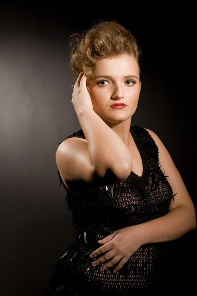 Girl in a black dress — Stock Photo, Image