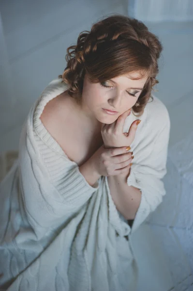 Portrait beautiful girl in a white sweater — Stock Photo, Image