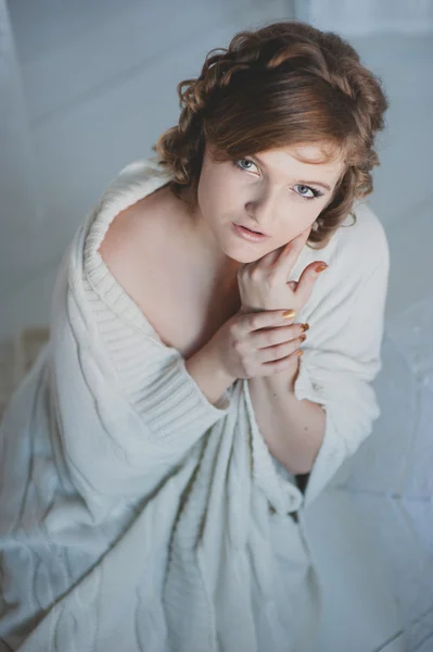 Portrait beautiful girl in a white sweater — Stock Photo, Image