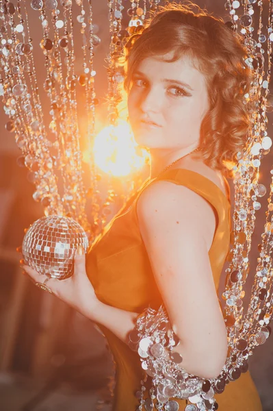 Beautiful girl with retro disco ball — Stock Photo, Image