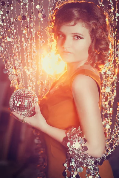 Beautiful girl with retro disco ball — Stock Photo, Image