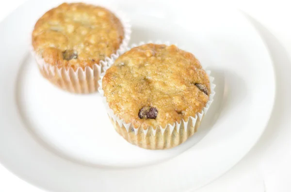 Two Banana & Chocolate Chip Muffins — Stock Photo, Image