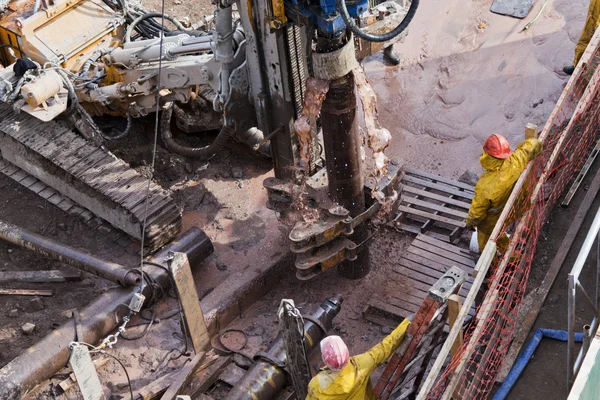 Trabajadores de la Construcción y Máquinas — Foto de Stock