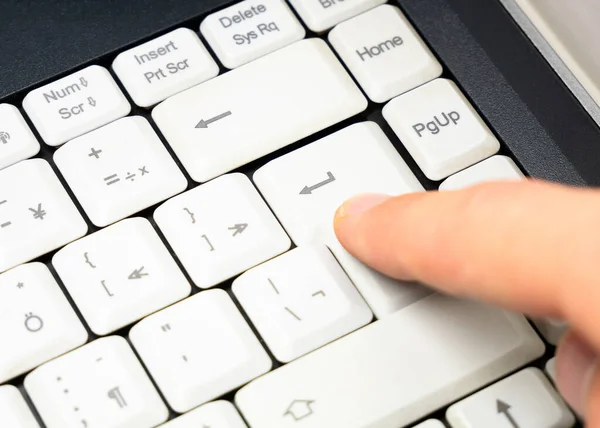 Man Pressing Enter Key Simple Plain White Laptop Keyboard Finger — Stock Photo, Image