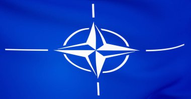 NATO askeri ittifakının resmi bayrağı rüzgarda dalgalanırken, Kuzey Atlantik Antlaşması bayrağı tam kare, yakın plan, haber arka plan dokusu oluşturdu. Örgü arkaplan