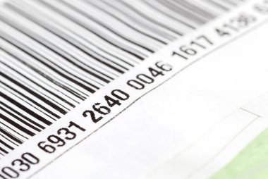 Bir barkod etiketinin parçası, ürün paketindeki numaralar, nesne detayları, makro, aşırı yakın çekim, kimse, sığ dof. Perakende satış, ürün kaynağı, sayı, kimlik, ticaret, ekonomi, iş konsepti