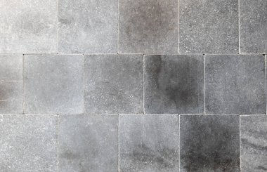 Simple heavy light grey square tile raw brick wall surface structure background texture, front view, nobody, no people Modern contemporary interior design, gray rough finish texture wall, frontal shot