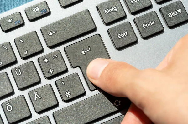 Man Pressing Enter Key Modern Computer Keyboard Top View Hand — Stock Photo, Image