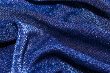 Parlak ışıl ışıl lurex kumaş dokusu mavi.