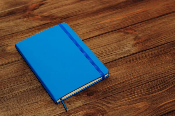 Blue Notepad Diary Lies Wooden Table Management Concept — Stock Photo, Image