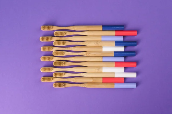 Wooden Toothbrushes Purple Background — Stock Photo, Image