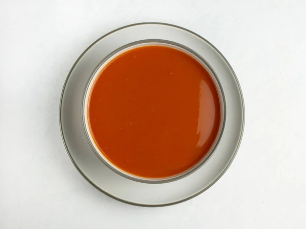 Vue Dessus Soupe Aux Tomates Dans Bol Sur Plaque Blanche — Photo