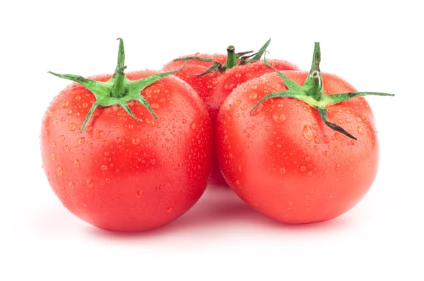 Tomate mit grünem Blatt und Tropfen — Stockfoto