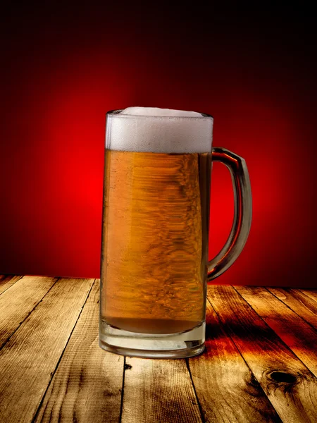 Beer glass on dark background — Stock Photo, Image