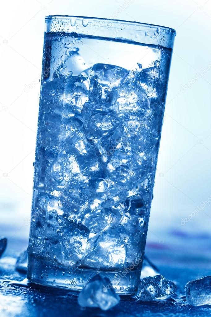 Glass of water with ice cubes