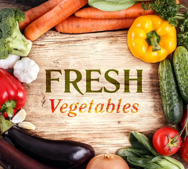 Vegetables on wood background — Stock Photo, Image