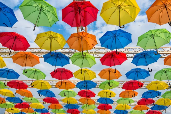 Many umbrellas coloring the sky — Stock Photo, Image