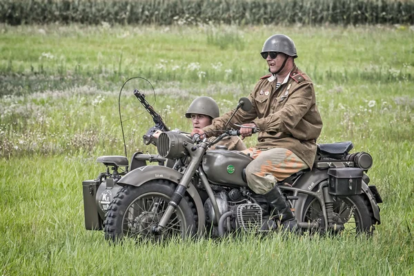 Soviet soldiers riding a sidecar — Stock Photo, Image