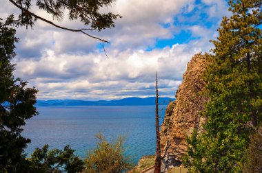 Cave Rock at Lake Tahoe, Nevada, with Sierra Nevada Mountains in the background.