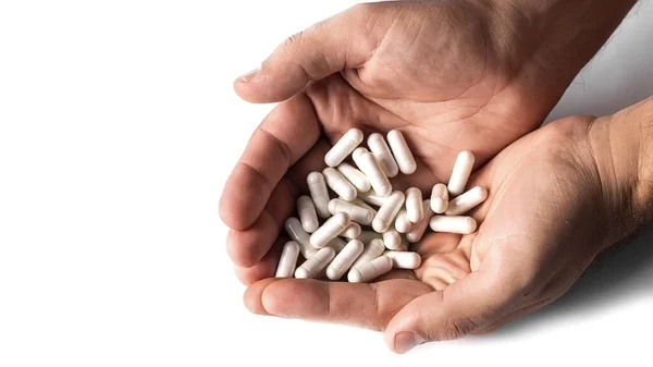 Męskie Ręce Trzymające Tabletki Kapsułki Białe Lekarstwa Odizolować Białym Tle — Zdjęcie stockowe
