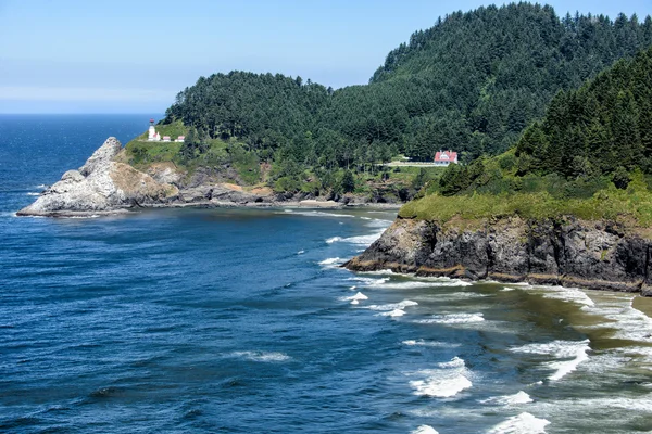 Rugged Oregon Coast with Lighthouse Royalty Free Stock Photos