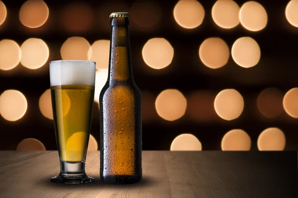 Fresh cold beer on beautiful bokeh background — Stock Photo, Image