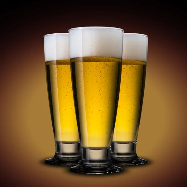 Cold beer glass on wood table — Stock Photo, Image