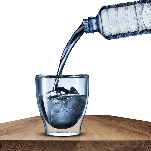 Water Bottle pour the water into the glass Stock Photo by ©somchaij