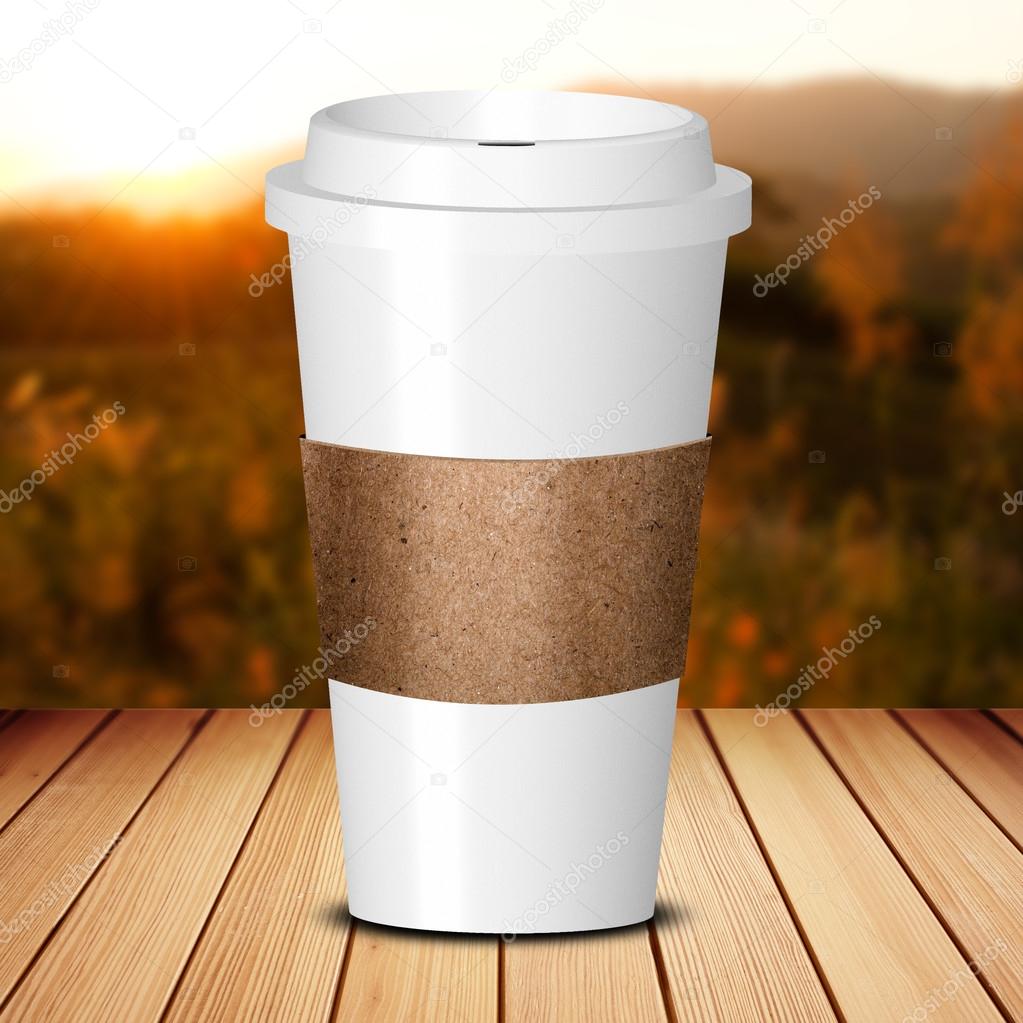 Take away coffee cup on wood table