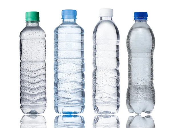 Τέσσερα μπουκάλια νερό — Φωτογραφία Αρχείου