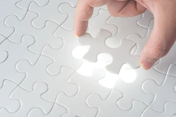 Missing jigsaw puzzle piece Stock Photo