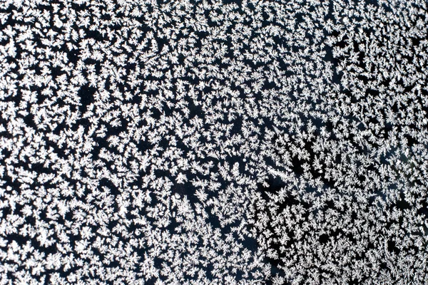 Flocos de neve na janela — Fotografia de Stock