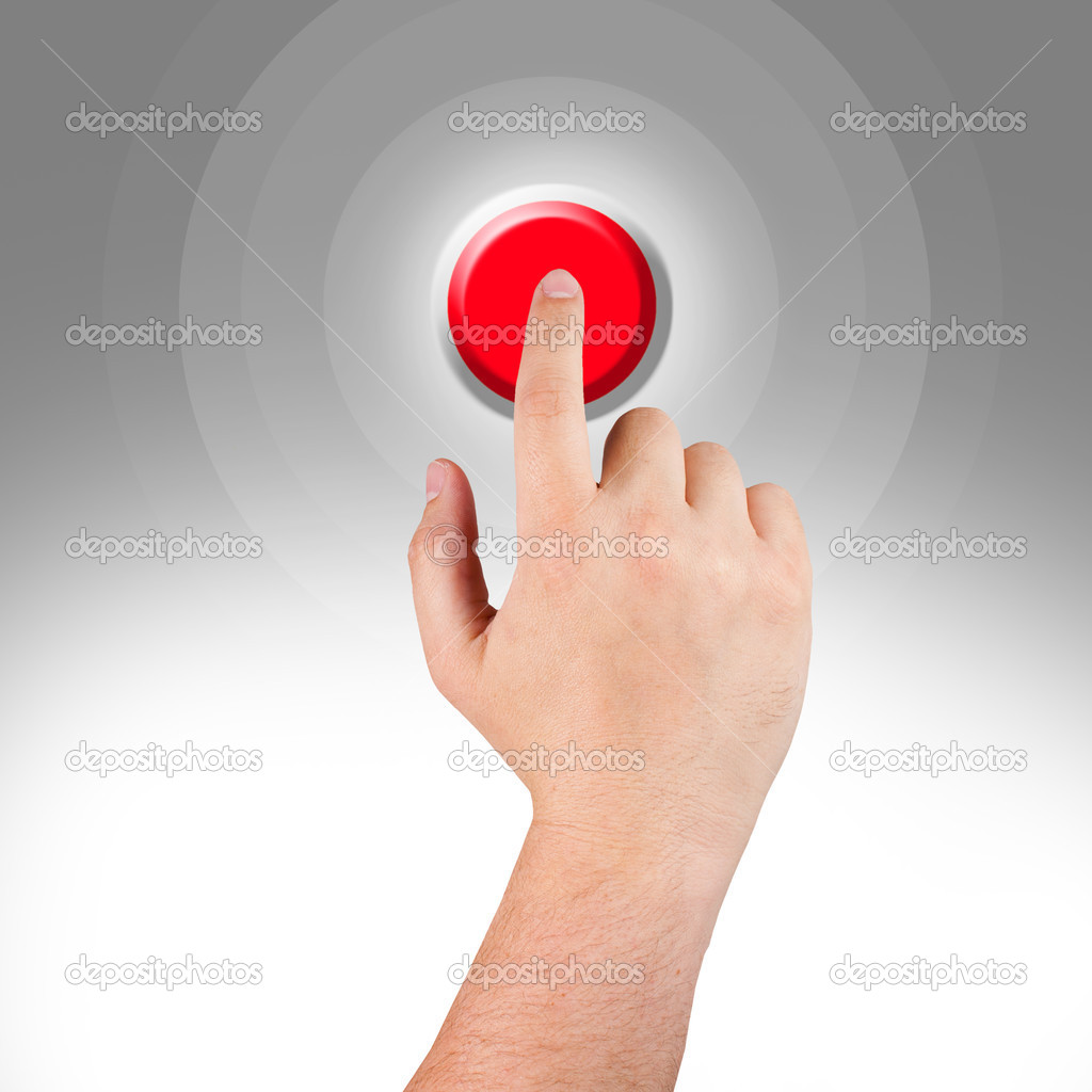Hand pushing red button