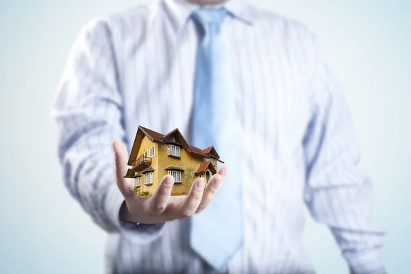 House in business man's hand — Stock Photo, Image