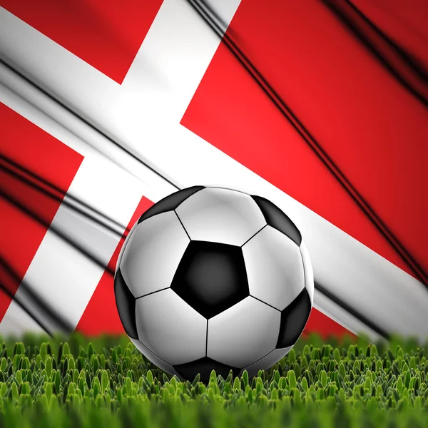 Balón de fútbol con bandera de Dinamarca en el fondo — Foto de Stock