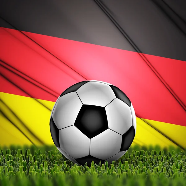 Fußball mit Deutschland-Fahne im Hintergrund — Stockfoto