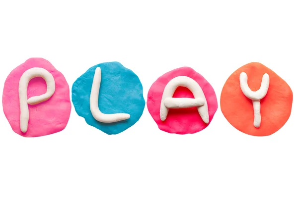 Разноцветный пластилиновый алфавит в форме слова Play — стоковое фото