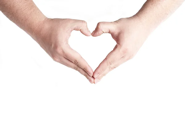 Mänskliga händer bildar ett hjärta — Stockfoto